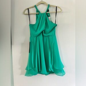 Green Bebe dress.  New with tags. Size 6